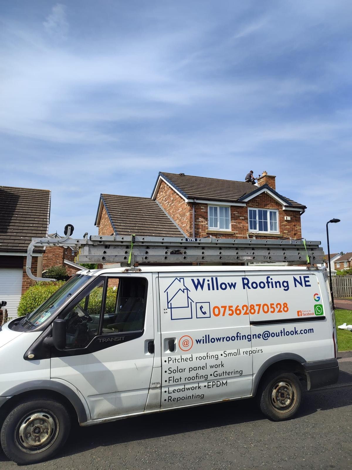 Willow Roofing van close-up, house behind, sunny