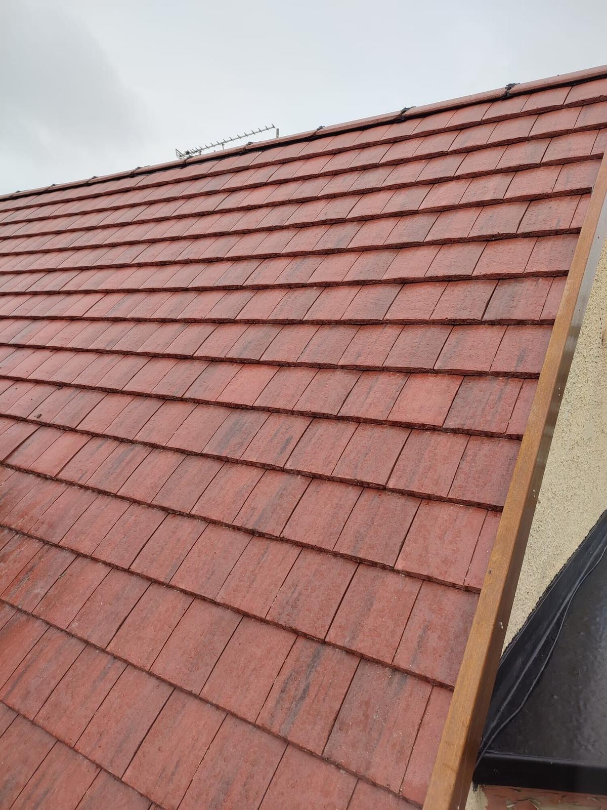 neat mortar verge on red plain tiles