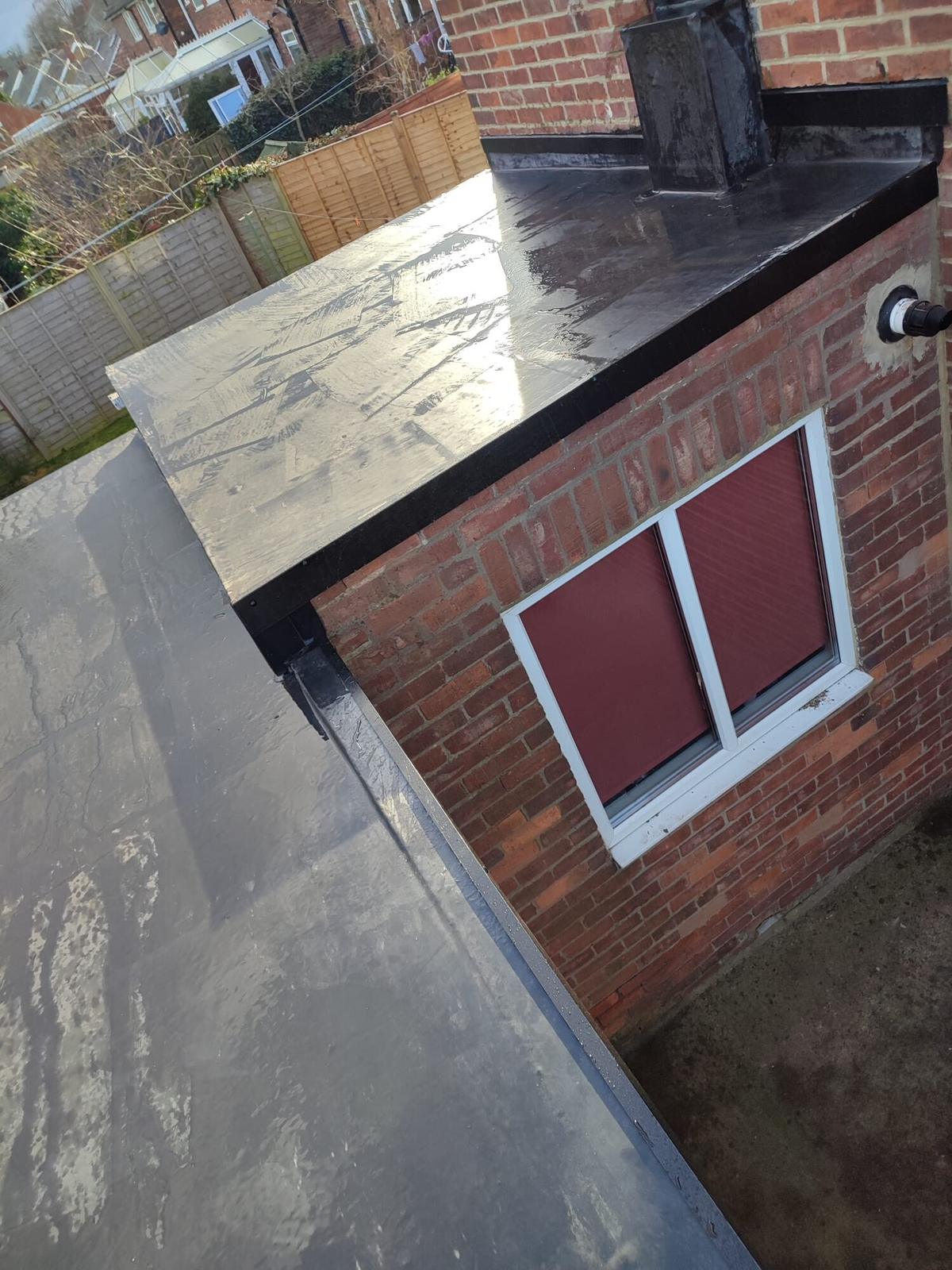 EPDM-wrapped dormer outbuilding, tidy corners