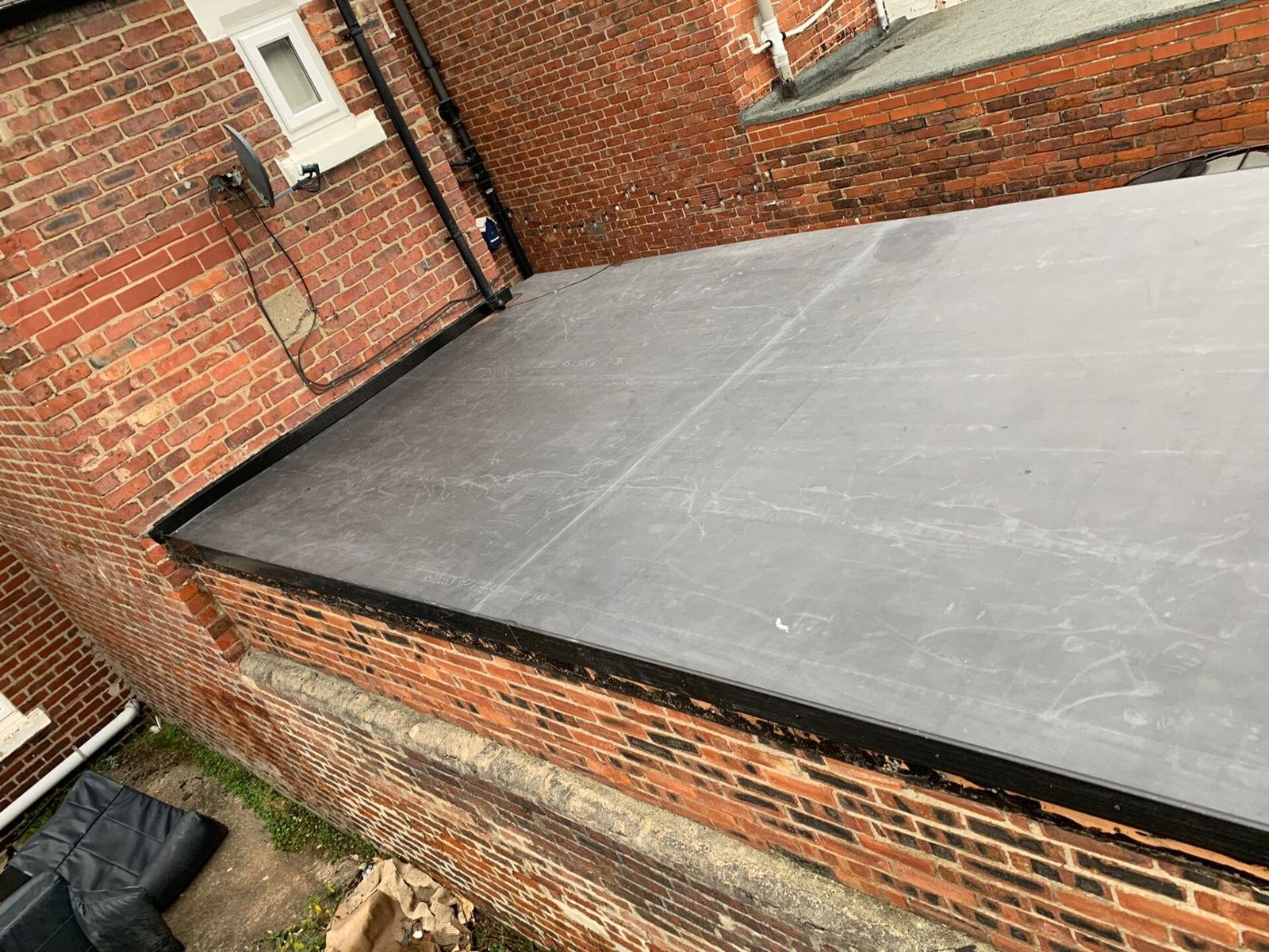 EPDM outbuilding roof with crisp edge trims — recent Willow Roofing work