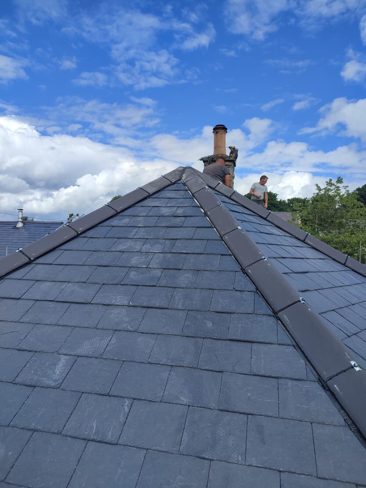 Willow Roofing team working at the chimney on a newly slated hip roof
