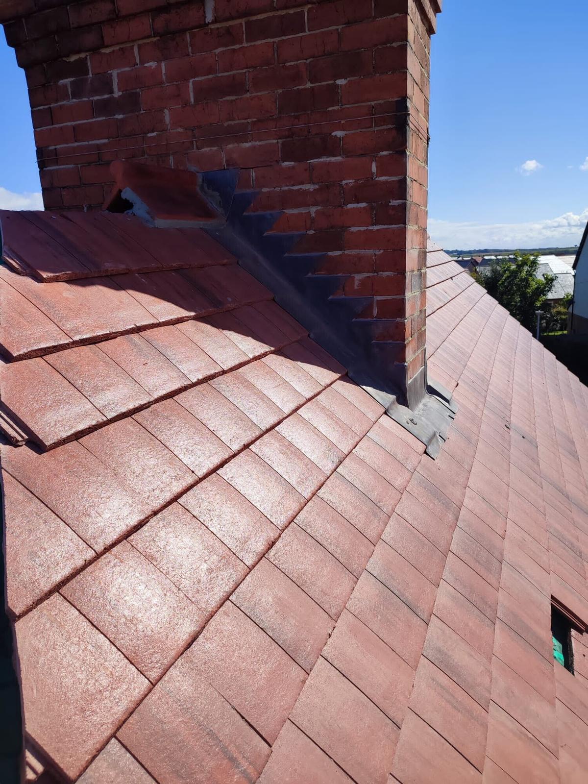 new red tiles with lead chimney flashing