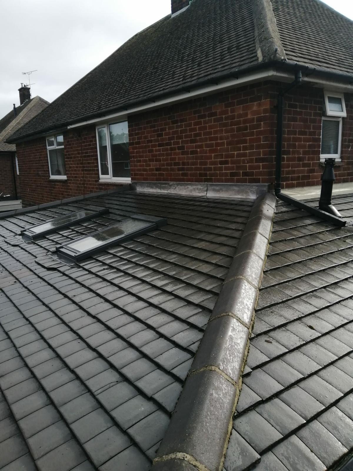 grey tiled semi roof finished, from above