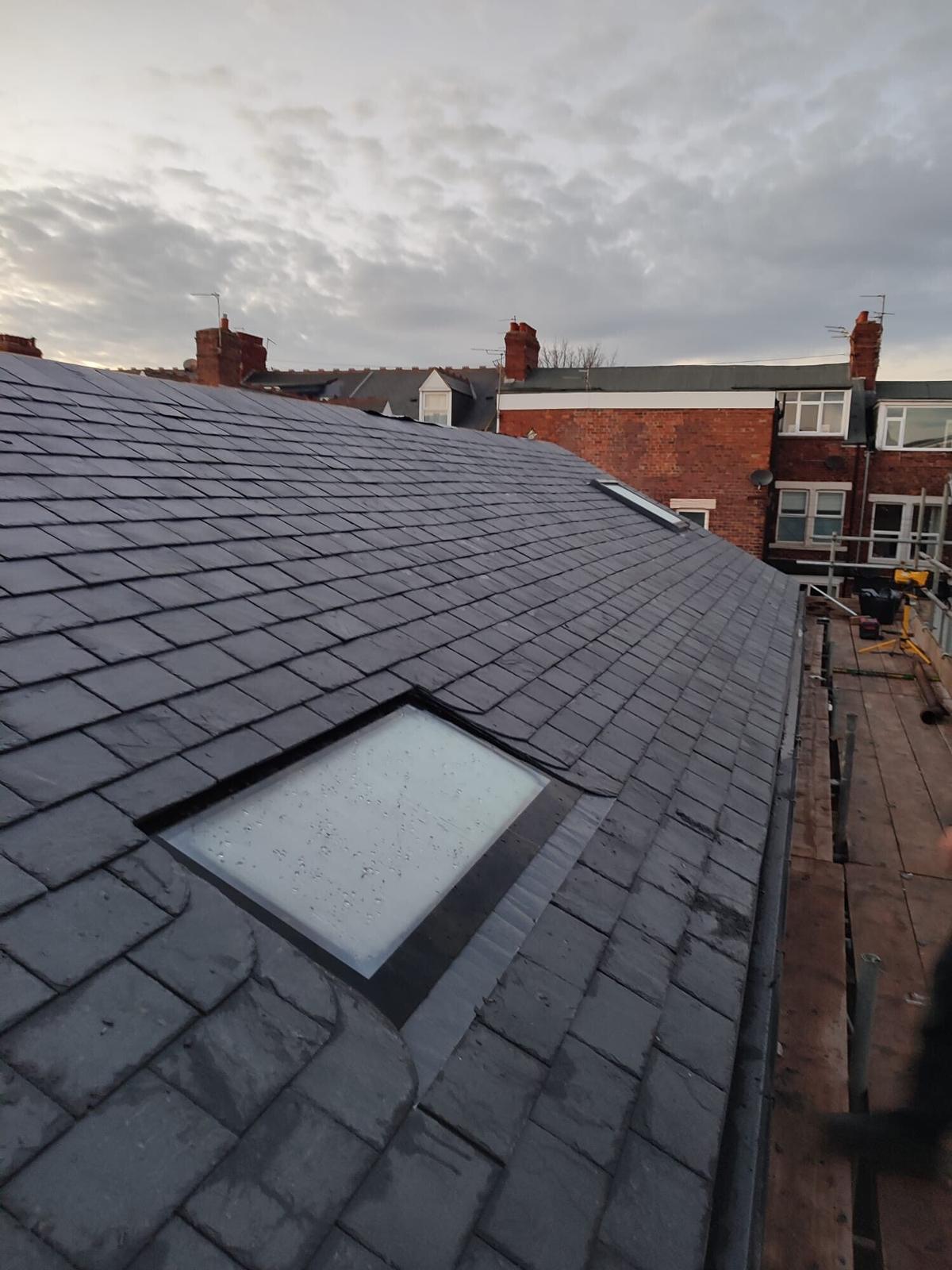 grey slate roof with new velux, from above