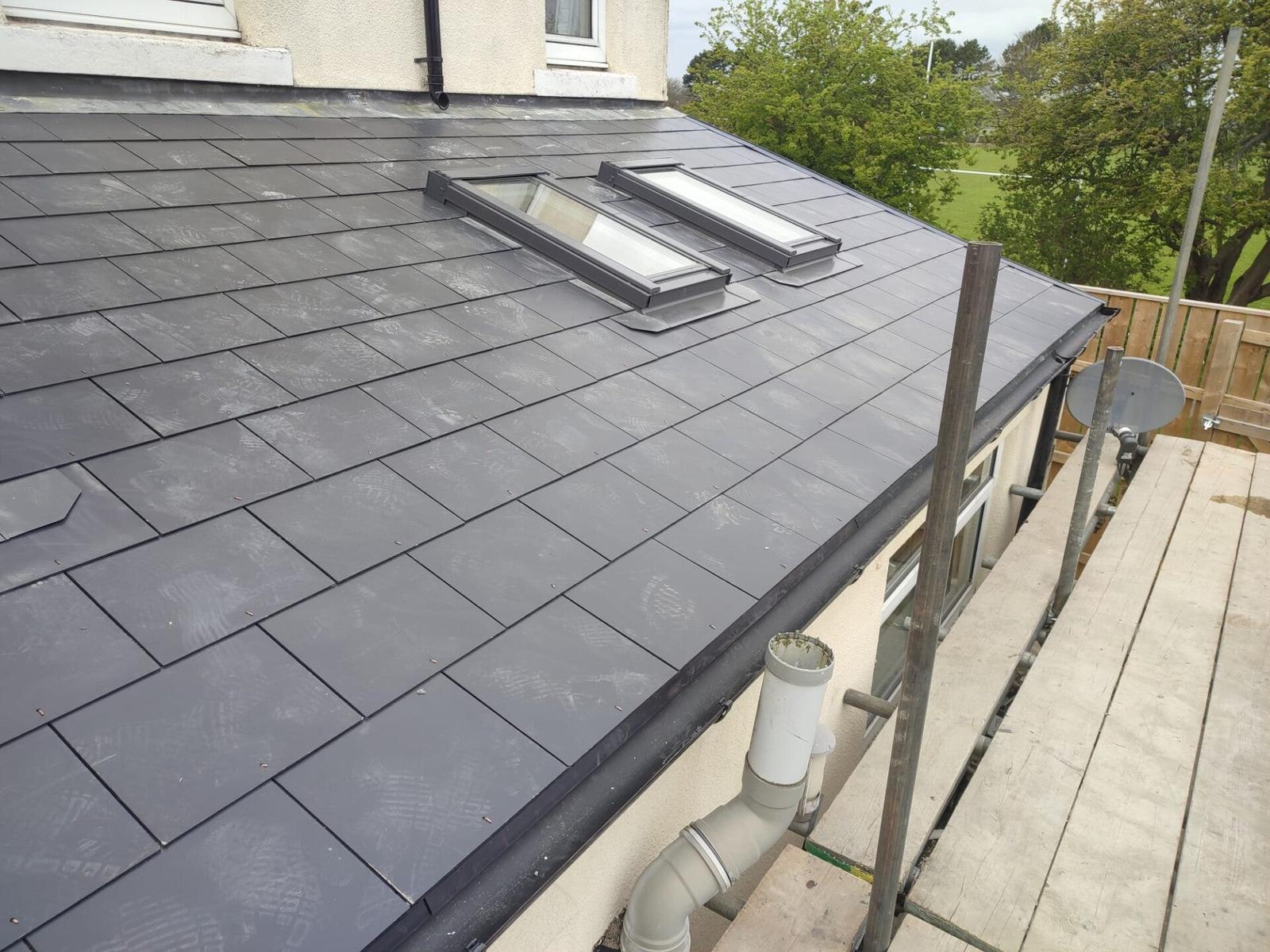 grey slate roof with velux and flat junction — recent Willow Roofing work