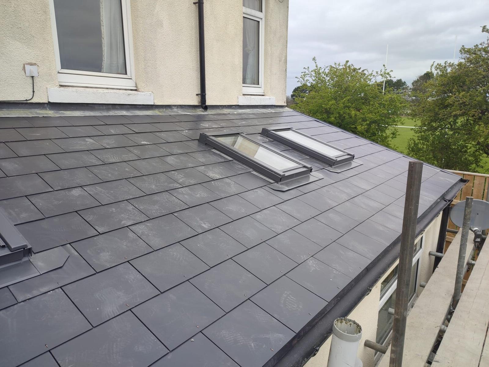new grey slate roof with velux from above