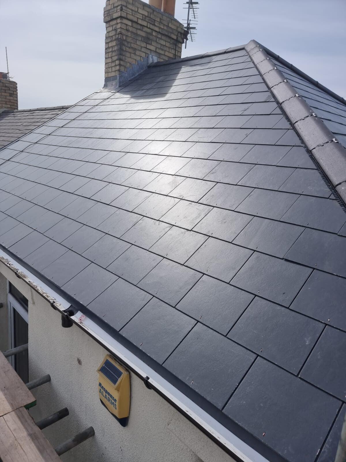 finished grey slate bungalow roof from above