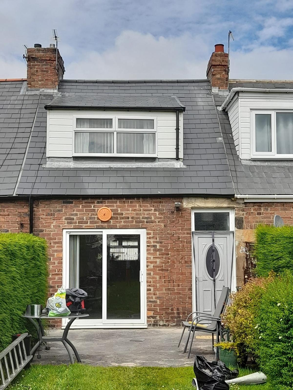 terrace re-roof, new slate and white fascia, front