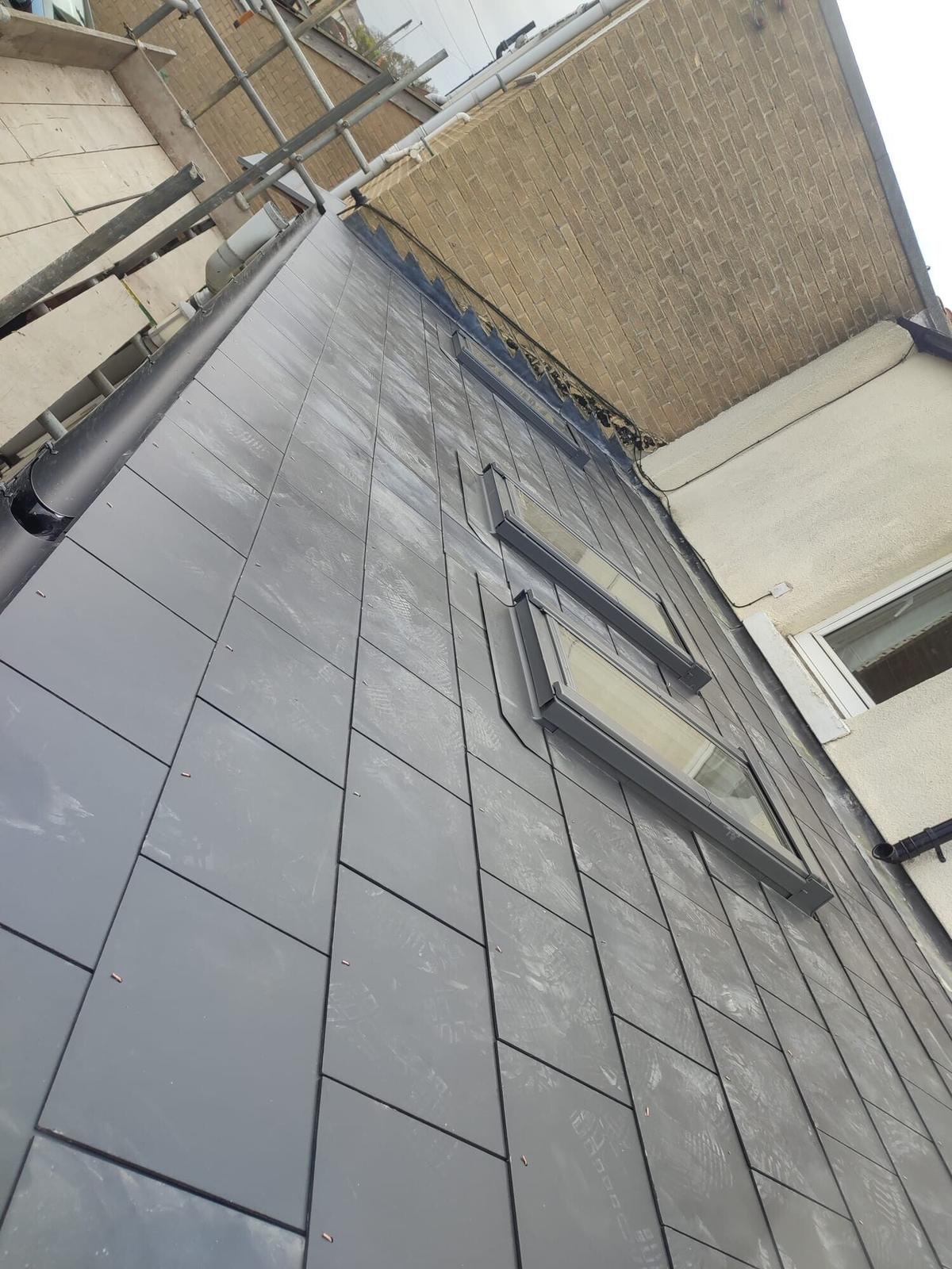 steep slate roof with velux, aerial angle